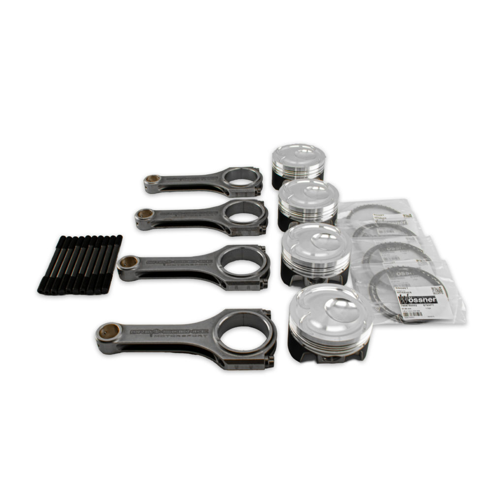 The image shows a set of performance engine parts including dreamscience branded connecting rods, Wosner piston heads, a set of ARP head bolts and a set of 4 piston rings. 